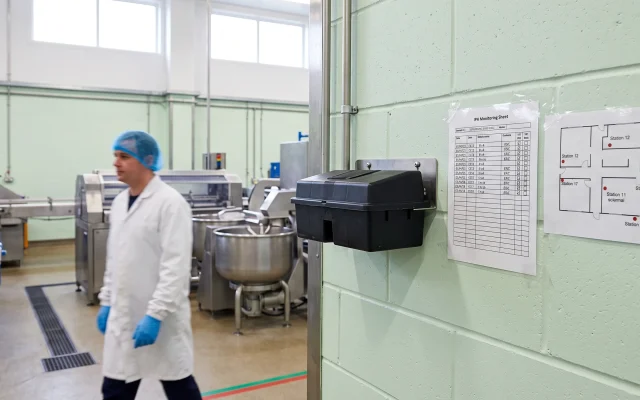 Food manufacturing plant interior showing pest monitoring station mapped along the wall, brc pest control standards, brcgs issue 9 pest control, brc pest control requirements for food manufacturers